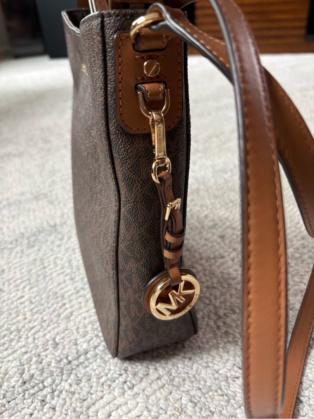 Michael Kors Brown and Tan Logo Charm Crossbody Bag